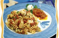 Fussili with sundried tomato sauce, mozzarella balls & herbs 